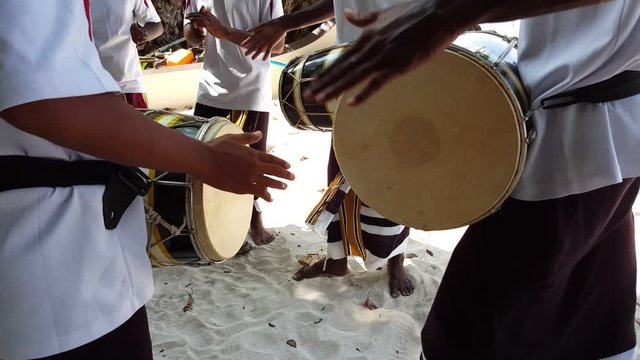 Performance of traditional Maldivian bodu beru (big drum) players, cultural and entertainment event during vacation days