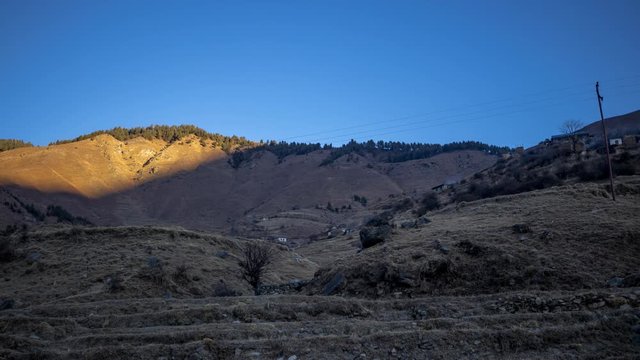 Sun-rise revealing a hill in Shinja Valley, Jumla, Nepal. Wide Shot.