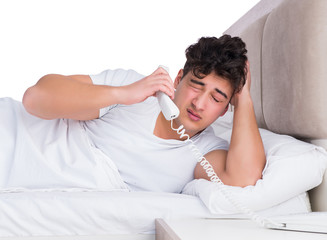 Man in bed suffering from insomnia