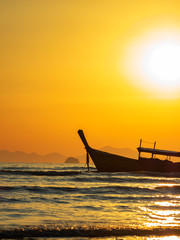 Traditional long-tail boat on the beach in Thailand