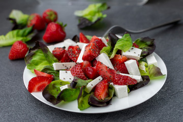 Strawberry ricotta salad with oakfeaf lettuce and chia seeds