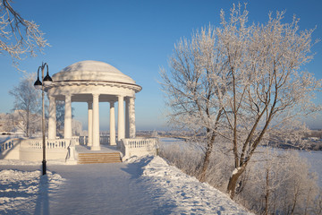 Winter landscape of white rotunda by the Vyatka river in Kirov, Russia