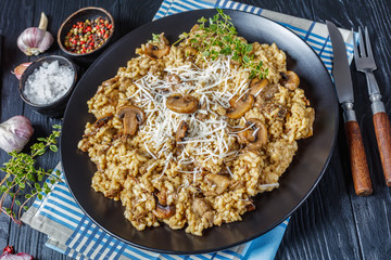 wild mushrooms Creamy risotto on a plate