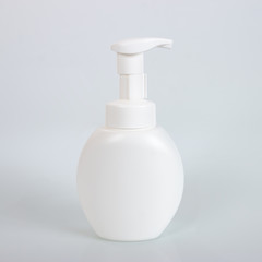Cosmetic bottle can sprayer container. Dispenser for cream, soups, foams and other cosmetics. Cosmetic container on white background.