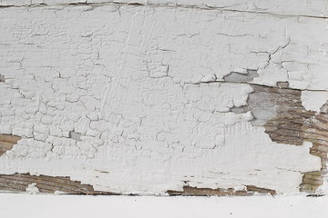 剥がれた白ペンキ