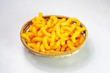 corn sticks in a straw basket