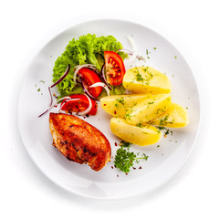 Chicken breast with boiled potatoes and vegetable salad