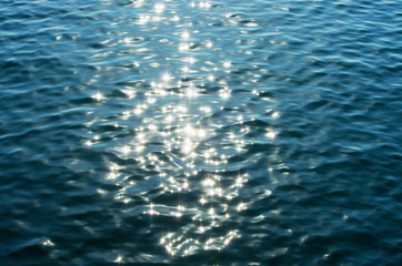 Lights on sea background. Waves.