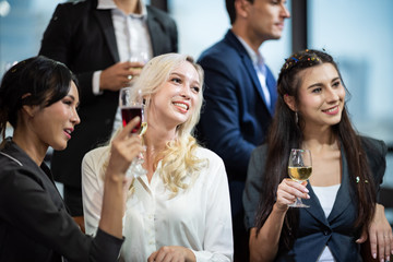 Business partners toast champagne company event celebration success