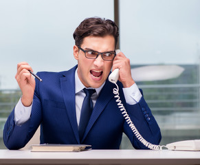 Angry call center employee yelling at customer
