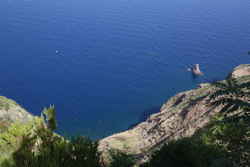 Fototapeta na wymiar A view of a rocky shore in Lipari island, Aeolian Islands