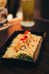 Philadelphia roll sushi with salmon, smoked eel