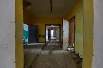 Fototapeta na wymiar Hallway at communist abandoned soviet military base in east Germany - Secret town Russian cold war nuke site