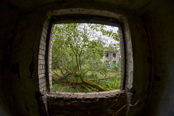Abandoned East Germany soviet military base Window facing abandoned building