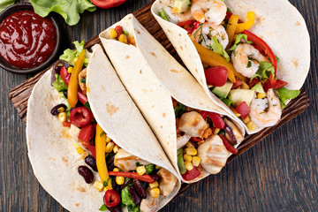 burrito with vegetables and tortilla