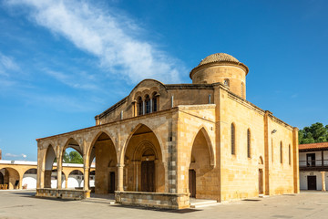 Square with Agios Mamas church with bell tower, Guzelyurt, Morphou,  North Cyprus