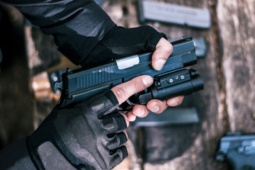 sports shooting instructor check your weapons close-up