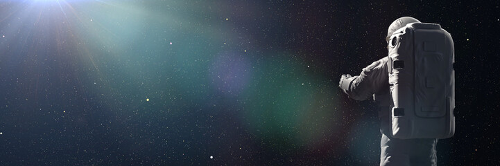 standing astronaut looking into empty space © dottedyeti