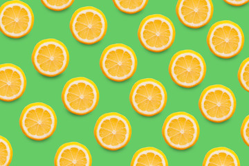 Fototapeta na wymiar Food pattern of slices of fresh yellow lemon, healthy vegetarian fruit sour taste, healthy vitamin food