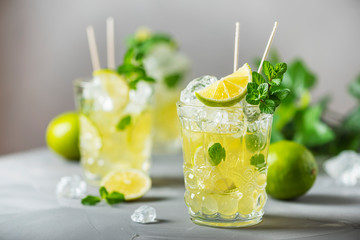 Cold tea with lime, mint and ice