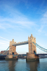 Fototapeta na wymiar Scenic daytime view of Tower Bridge crossing the River Thames in London under bright blue sky