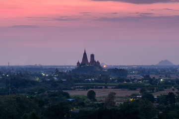 Wat Tham Sua temple on hill with colorful sky at dawn