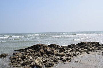 Beach with rocks of various sizes after the tide
