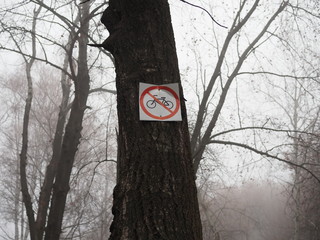 sign Cycling is prohibited in the forest