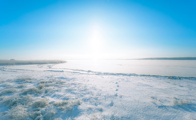 Obraz na płótnie Canvas Cold winter day landscape with snowy trees. Photo from Sotkamo, Finland.
