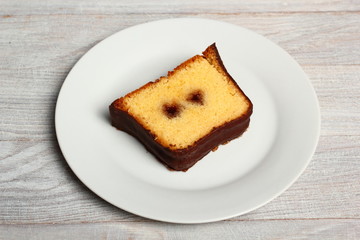Chocolate glazed loaf cake with strawberry jam