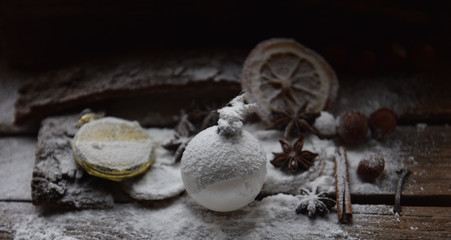 Christmas still life Christmas decorations balloon orange clock snow and powdered sugar