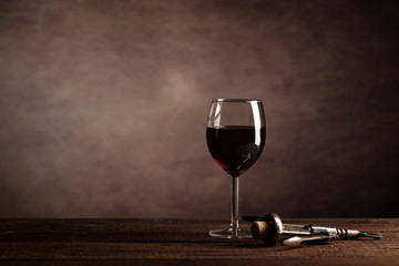 Red Wine in glass on a dark background with copy space