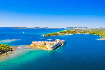 Fototapete Fotos Saint Nicholas fortress and Jadrija town at Sibenik bay entrance, Dalmatia, Croatia, drone aerial shot of beautiful blue coastline seascape  © ilijaa