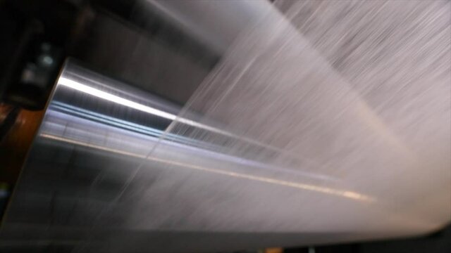 Nonwoven fabric production, polyester production in a modern factory. Nonwoven fabrication process