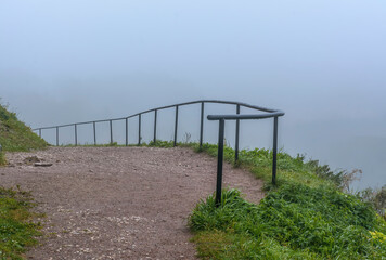 Foggy autumn morning in the ancient city of Izborsk.