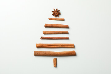 Christmas tree made of cinnamon on grey background, space for text