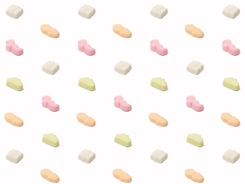 Meringues (Schuimpjes), Zwarte piet and beetles, Sinterklaas candy, white background pattern
