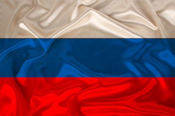 photo of the national flag of Russia on a luxurious texture of satin, silk with waves, folds and...