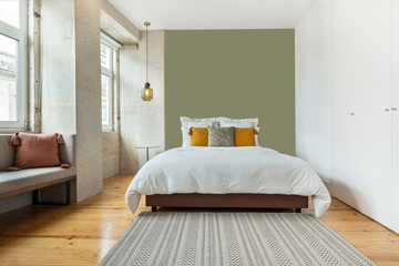 Light modern interior design, apartment with double bed and big windows