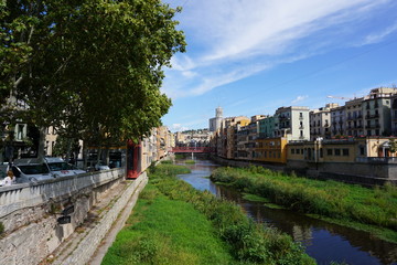 Fototapeta na wymiar Girona, Spain, view from Post de Pedra, colourful buildings at the Riu Onyar