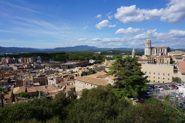 Fototapeta na wymiar Girona view from the top, amazing landscape with Pyrenees in the background.