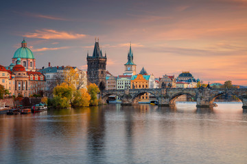 Prague, Czech Republic. Cityscape image of famous Charles Bridge in Prague during beautiful autumn...