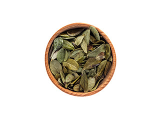 Dry petals of Vaccinium vitis-idaea in a wooden Cup on a white background