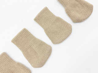 Special Table Foot Protector from Fabric Socks in White Isolated Background