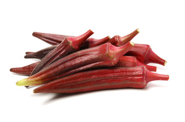 Red okra on white background