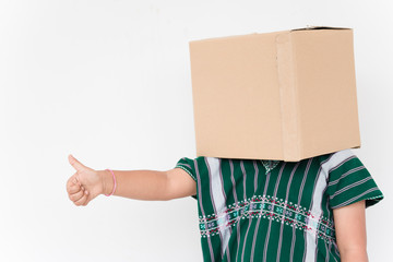 Young boy over isolated white background holding a box to move it to another,brown box