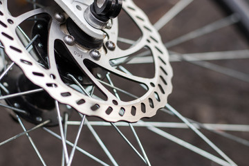 Fototapeta na wymiar Part of Mountain Bike brake disc in close up.