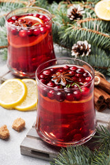 Cranberry juice with lemon and cane sugar. Winter hot drink.