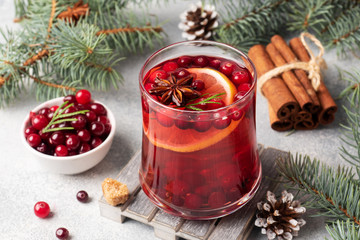 Cranberry juice with lemon and cane sugar. Winter hot drink. © Elenglush