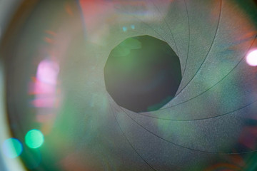 The Eye of The Camera. The Selected Fiocus on The Aperture Blade from Camera's Lens with Bokeh and...